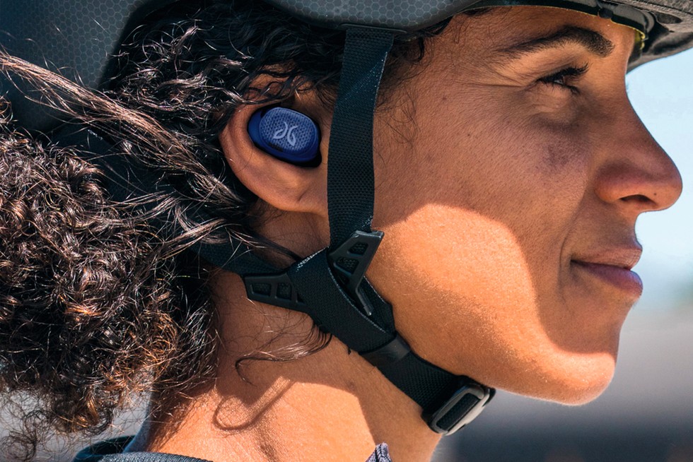 A runner in the jaybird running headphones